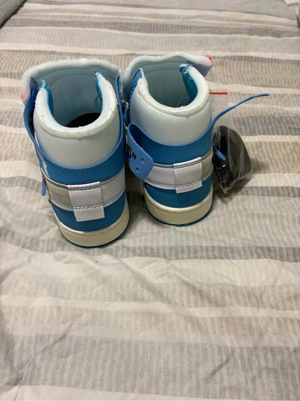 Jordan Men’s High-Top Sneakers in White and Blue with Orange Accents